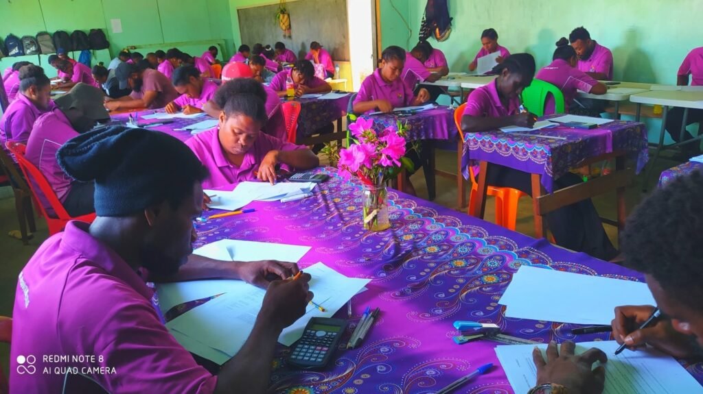 MTC students working together in class at the Togoba campus